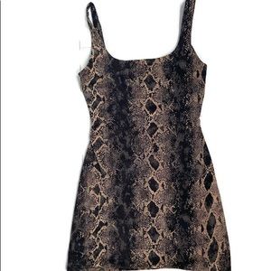 Vintage Snake print, short, and sexy form fitting dress